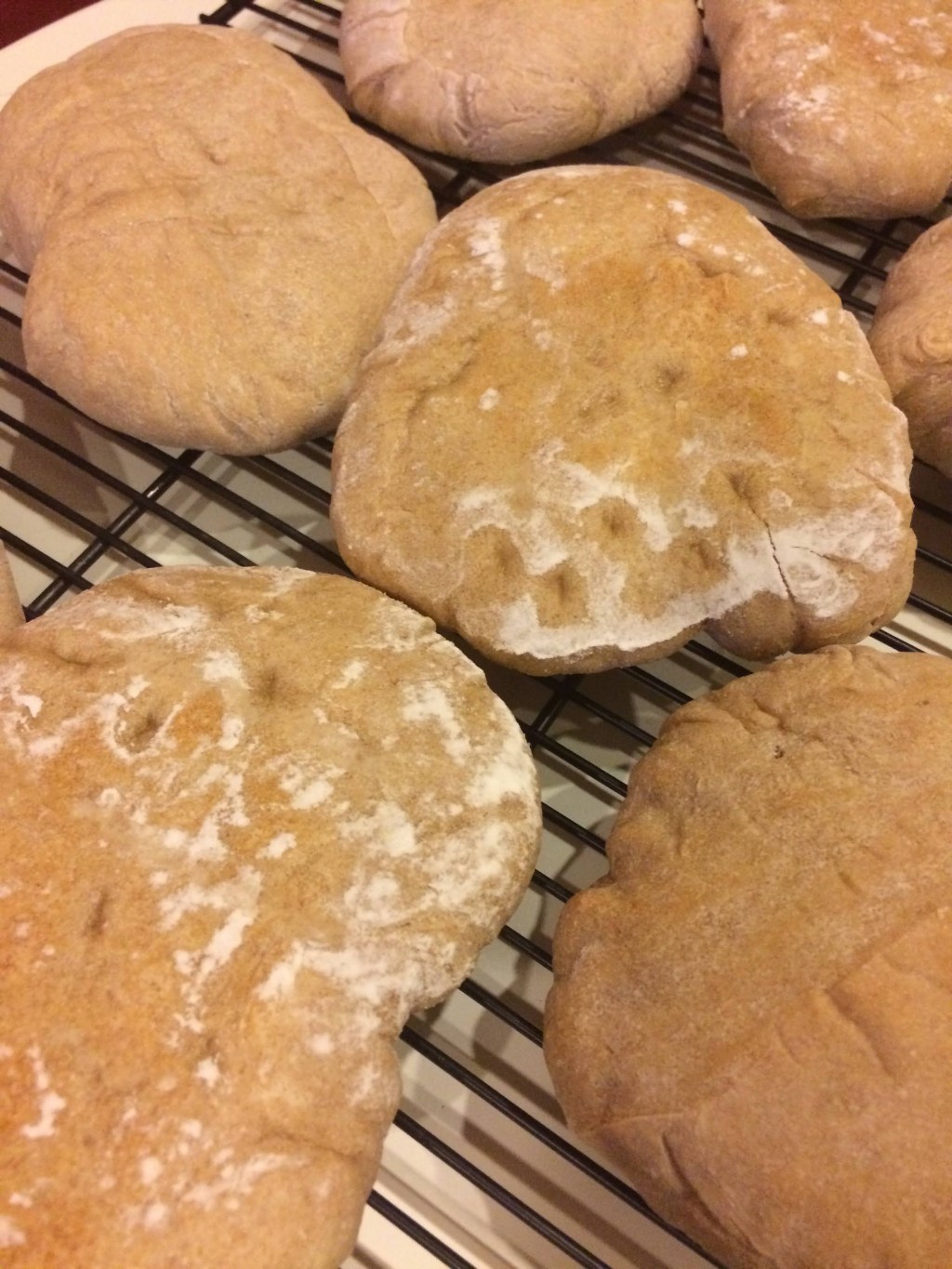 Fresh baked bread cooling on a rack