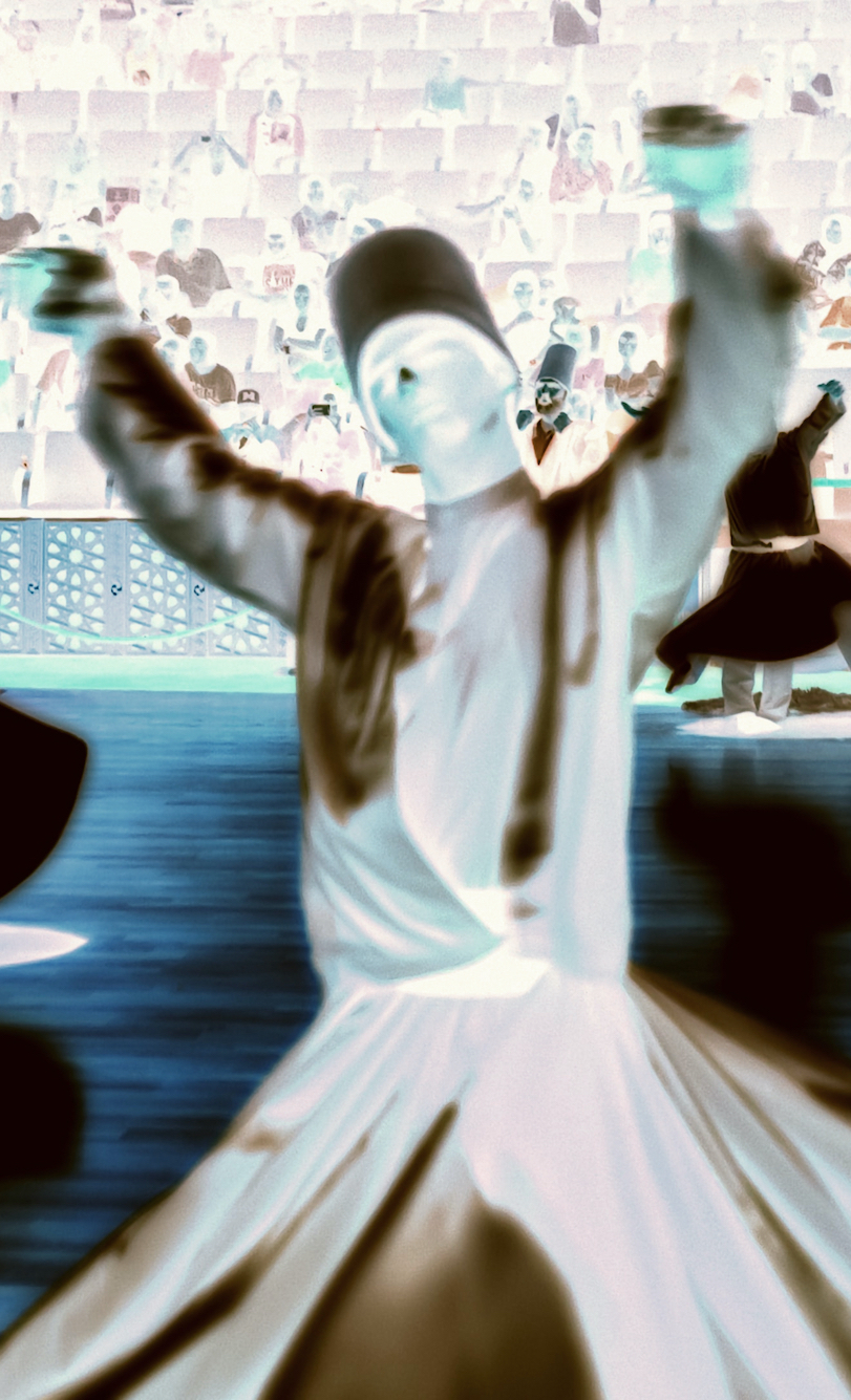 photo of male dancer with arms raised