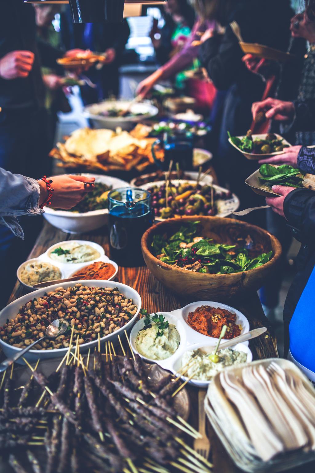 photo of a long table with a buffet of food