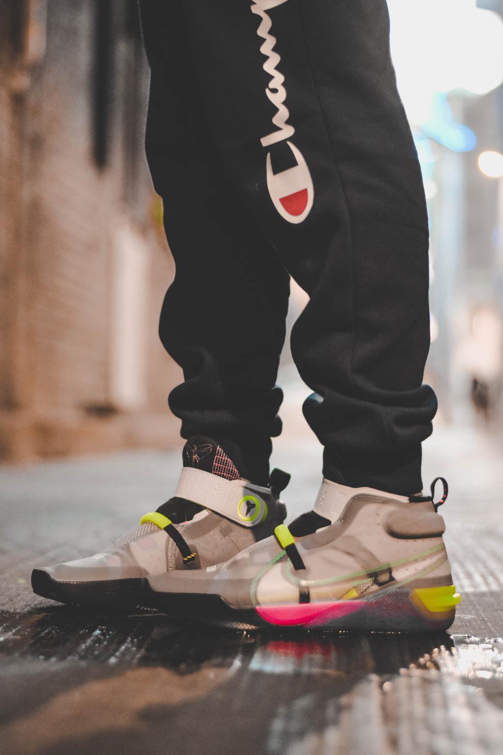 photo of boys legs with sneakers on