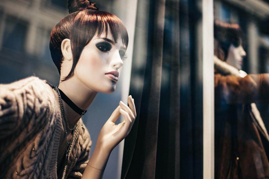 close-up photo of a female mannequin with make up and hair