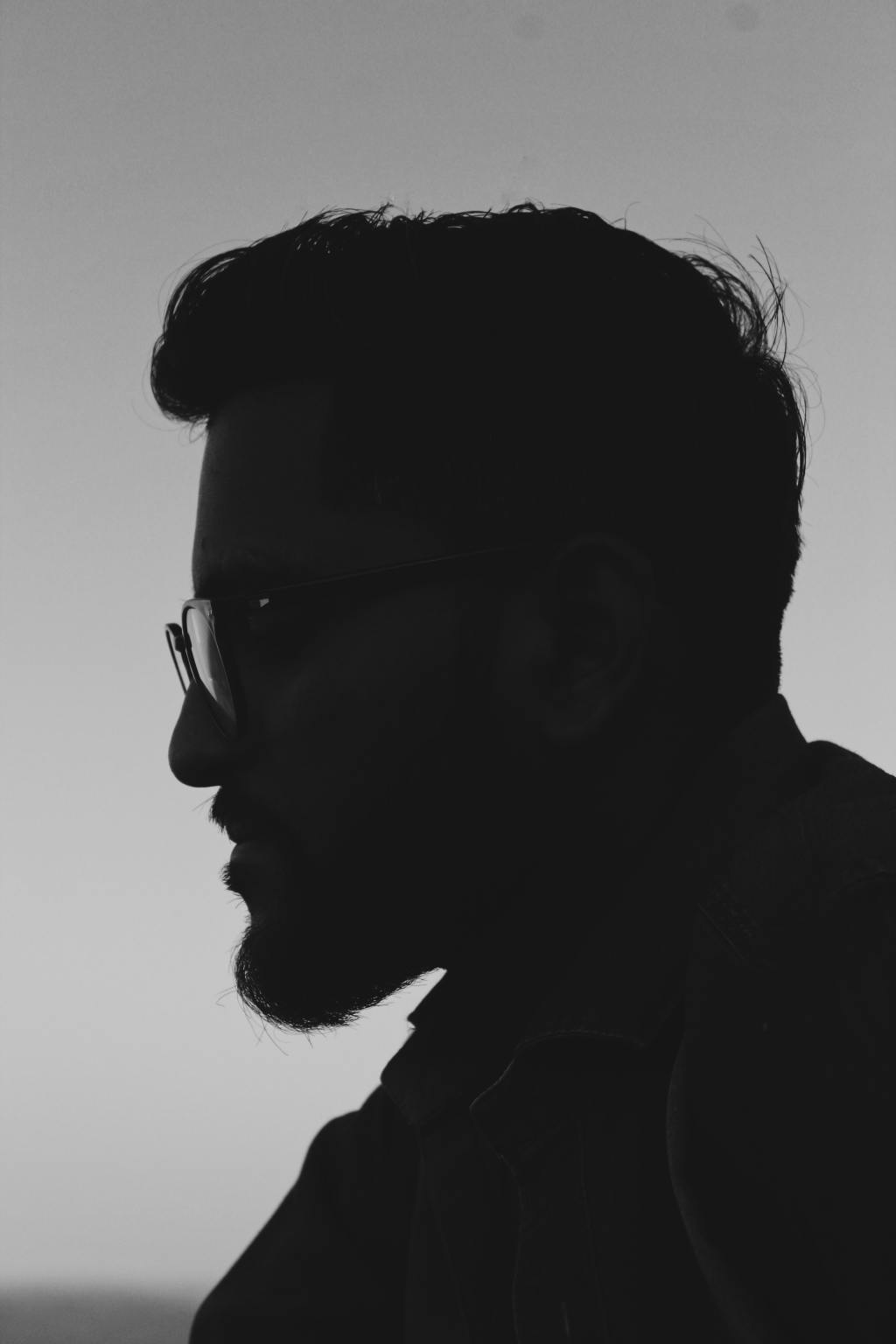 profile of a man in shadow