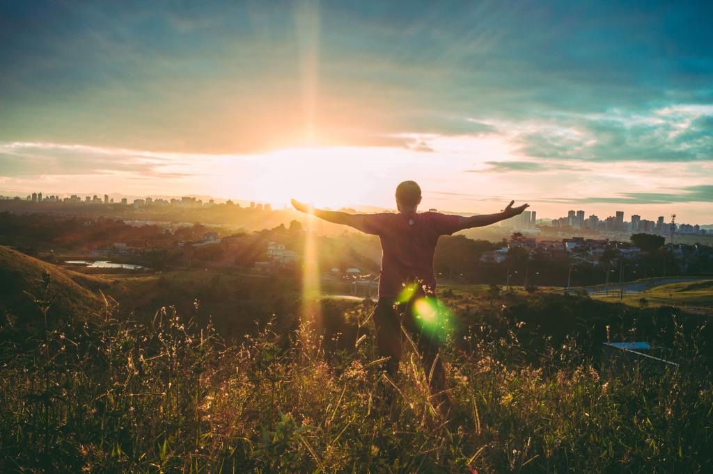 man blessing the sunset